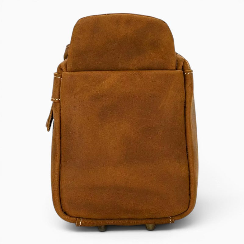 Le Voyage Prestige sac de voyage compact en cuir marron, idéal pour le maquillage ou les articles de toilette.